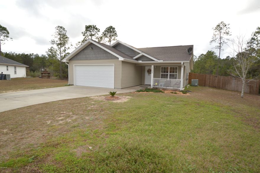 Move in Ready!!!This immaculate 3 bedroom 2 bath home,. Home is located in a nice country setting on paved street. Home features Cathedral ceilings in the living area and tray ceilings in the Master Bedroom. Living also features an electric fireplace for those cold evenings. The eat in kitchen has ample storage, good prep space and a breakfast bar and separate Dining Area. Off the Dining area is an extra room that could be used as a Florida room, office or just extra sitting room. Large back yard with privacy fencing. Lots of room to enjoy time with friends and family.Price Reduction !!!