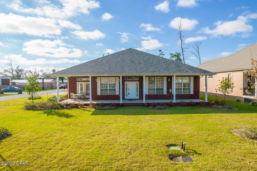 CURRENTLY UNDER CONTRACT, SELLER ACCEPTING BACKUP OFFERS. Great location!  Just 1 block from the Bay and 2 blocks to Porter Park which will give boating access close to home.  This BEAUTIFUL 3 bed, 2.5 bath, brick home features large open spaces with large windows for great natural light.  The kitchen is the favorite spot for entertaining with granite countertops and breakfast area with a french door leading out to the wide front porch.  Sit out and watch the Bay with your morning coffee or in the evening with a nice beverage. Raised ceilings and crown molding are throughout the home, hard surface flooring with only the guest bedrooms having carpet, tile in the baths.    The Primary ensuite is tucked away for privacy and has a sitting area, the bath is tile with large walk-in shower, water closet, two walk-in closets and double vanity. The guest bedrooms are large with extra storage above the closets.  The office has a lot of natural light and has double glass doors just off the front entrance.  Off the living area is a screened porch and deck overlooking the beautiful landscaping and yard.  This is a great neighborhood for walking, running, or cycling. Only a block to bay access so you can enjoy activities like fishing and kayaking. To top it off, this home has awesome curb appeal with great landscaping, luscious green grass, and a sprinkler system. Don't miss out on this wonderful property, call today!