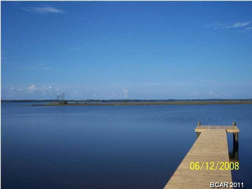Seller offering Buyer incentives. The East Parke waterfront subdivision is nestled on two acres of pristine shoreline on Northwest Florida's Emerald Coast, and offers six platted waterfront home sites with majestic views of Doty's Cove, and East Bay. The 446 feet of deep-water shoreline is accessible to Port St. Joe, Apalachicola, and the Gulf of Mexico to the east, and Panama City, Panama City Beach, Destin, and the Gulf of Mexico to the west, all via the Intracoastal Waterway. Lot 4 includes a 225 ft. dock. The common area infrastructure is in place to include brick paved driveways and parking, irrigated grounds, underground stubbed utilities, and decorative streetlights, the lots are ready for development.