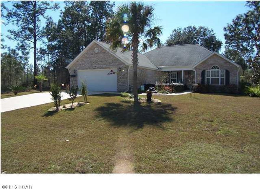 This beautiful home in a quiet country setting needs only you and your family! The owners are the original owners and have lovingly cared for and upgraded the home to make it a truly comfortable place to relax and enjoy living. The large great room features a vaulted ceiling and wood-burning fireplace along with French doors leading to the sunroom, which has a great view of the backyard. The oversized Master Bedroom suite has a unique trey ceiling, a sitting area, an adjoining master bath with a large garden jetted tub, a separate shower, a separate potty room, a walk-in closet measuring 8?x8?, and not to mention sliding French doors leading to a screened porch with a hot tub. With a split bedroom plan, the two additional bedrooms are found on the opposite side of the home, separated by

a