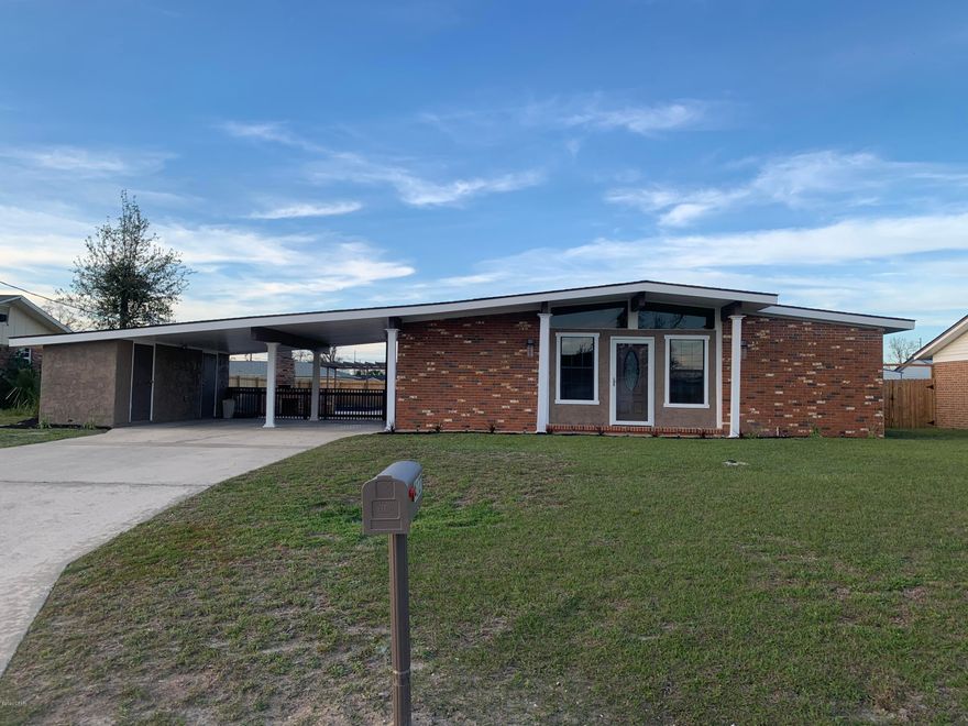 From the front windows to the covered carport to the large patio area with brick fireplace, this home just invites being outside.  The home sits on a nice size lot that has a privacy fence back yard & pergola.  The home has been completely remodeled from the new roof to the new floors.  The home has an open floor plan with a large kitchen & breakfast bar.  There is a bonus room off the living room that could be a 4th bedroom, den, office, exercise or hobby room.  All the rooms are nice size & the homes feel larger than the measurements read.  Under the carport is a storage room that could be a workshop or used for the laundry room if converting the bonus room into a bedroom.  Put up some deck lights on the patio, light a fire and enjoy some outside time!