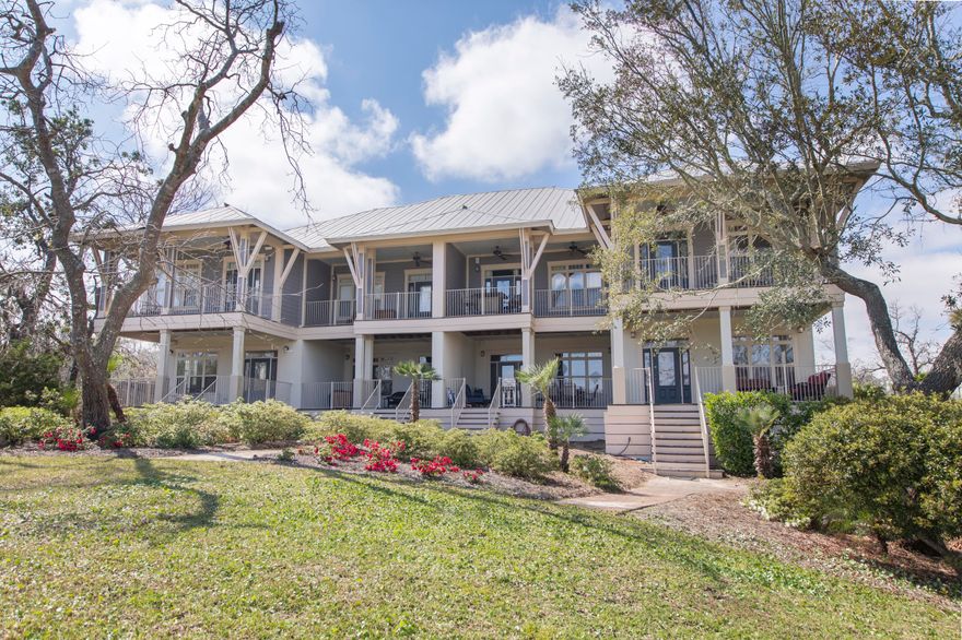 Come see this beautiful 4 bedroom 4 bathroom townhouse on the water! Located in a quiet area this home comes complete with a boat slip and community pool. Exterior is a craftsman inspired cottage with brick paver roads curving through the old Live Oaks leading to the Bay which brings back that Old Florida Charm. Master suite comes with his and her walk in closets, whirlpool tub, and a covered deck over looking the bay. This place is a breath of fresh air perfect for your next home or home away from home. Come see today!