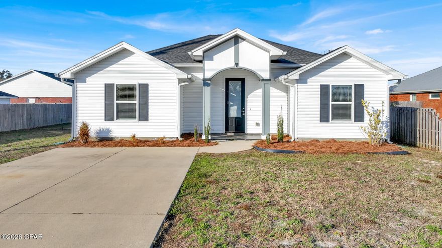 Priced to sell! This 2018, 4 bedroom, 2 bath home is located near Tyndall Air Force Base. The open living area features a raised ceiling and crown molding with LVP flooring throughout. The kitchen offers an island, tile backsplash, granite countertops, soft close cabinets, and stainless steel appliances.

The primary bedroom includes a tray ceiling, large en-suite bath with granite countertops, and a walk in closet. Secondary bedrooms are spacious with good natural light. All window coverings convey.

Enjoy a large fenced in backyard with a storage shed. The home is vacant and move in ready. Measurements are approximate and should be verified if important.