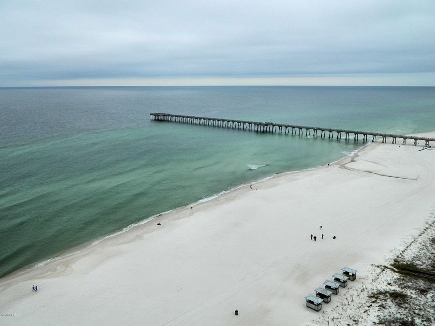 Condo with popular Gulf-Front master bedroom for sale right on the beach. While convenient to water park, shopping, dining and entertainment, this resort is a bit quieter and relaxed. Beachfront pool and bbq areas. Enjoy the easy flow floor plan, high ceilings cute kitchen, oversized private balcony. Lots of NEW stuff 2018: Water heater, appliances, bedroom flooring, sofa sleeper. AC 2014. Owner projects 2019 rental income in the mid $30s. Seller will transfer future bookings and collected monies to buyer at closing. Owner's pets welcome. On the trolley line to Pier Park! The streetscape is undergoing a transformation so will be beautiful soon! If it's time for you to change your life and buy a piece of this beach paradise, call your favorite Realtor today! The only thing missing is you