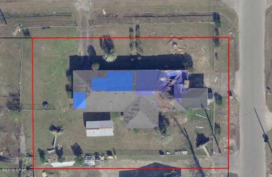 Awesome INVESTMENT OPPORTUNITY in LYNN HAVEN!! Existing home has moderate to severe hurricane damage. Large corner parcel 100X150 that could be subdivided to build two new construction homes!