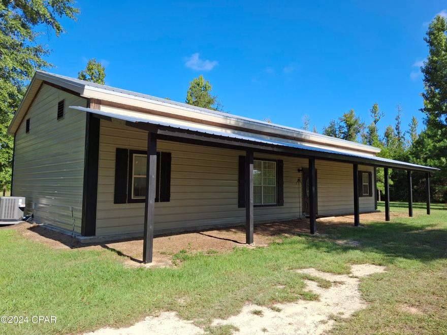 NEW, IMPROVED PRICE...$370,000!!
10.21.2024.

Welcome to 2731 State Correctional Rd.
A BEAUTIFUL BARNDOMINIUM Featuring 4 BR, 2 BA,, Wide Open Ceilings, all situated on 5  ACRES of land with access to a private fishing pond from the backyard! This modern country style design open floorplan featuring over 100 year old support beams hand milled from  Douglas Fir / Cedar. 2x6 Construction with Steel Trusses and OVER 300 Hurricane Straps in place!!, Steel Siding, Metal Roof.
BRAND NEW Sept. 2024... Luxury Vinyl Plank flooring, Carpets, Master Bathroom Shower, Vanity and Fixtures, Recessed Lighting, Exterior Shutters and Trim, Fresh Paint Throughout. Stainless Appliance Pkg. , Outdoor open front workshop, Dog Kennels with running water, Variety of Fruit Trees and so much more!!  This is a very well built house! Must See, Must Sell.