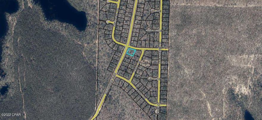 This almost 1/3 of an acre corner lot is located in the up-and-coming subdivision of Sunny Hills. This subdivision has its own golf course, swim park and recreational park (see photos). It is less than an hour from Panama City Beach and it is nearby numerous other lakes. Enjoy the country feel while not being far from the city. This particular lot is less than a mile from Porter Lake. Taxes include an $31.91 MSBU annual assessment.