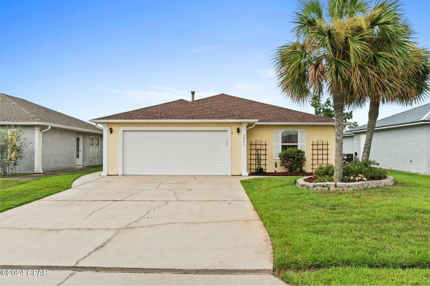 This 3-bedroom, 2-bath home features an open floor plan with a spacious living and dining area, a kitchen with ample cabinet storage and granite countertops. Living room features Bose surround sound system. The master bedroom includes a generous walk-in closet, and both bathrooms have double sinks and solar tunnel lighting that allows for great natural lighting.
Home is centrally located being only 20 minutes from Tyndall AFB, 20 minutes to the beach, and 10 short minutes to downtown Panama City.
The large screened-in porch, complete with a 6-person hot tub, TV mount, seating area, and dining space, is perfect for outdoor relaxation. The property includes a 2-car garage, well-manicured yard, and a fenced backyard with ambient lighting and a patio ideal for grilling.
Property has a well maintained 3 zone irrigation system already in place.
Recent updates include a new hot water heater in 2017, fresh exterior paint in 2020, a new roof in 2019, a new HVAC system in 2021, and a current termite inspection. This home also had all
windows glass replaced with double pane glass in 2019.