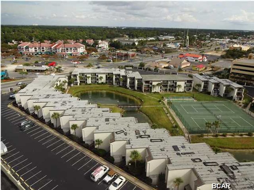 Fully furnished ground floor unit in a gulf front complex. Sugar Beach is a popular destination for families. Located within walking distance to restaurants, shopping, local bars, family entertainment. Private courtyard features lush well kept landscaping, fresh water lake, tennis courts, shuffleboard. BBQ grills and picnic area. Extremely well maintained pool and clubhouse. Park just feet from your front door. No running through a huge parking lot in the rain then having to wait for a slow elevator. Great investment as a vacation home and/or a money making rental.