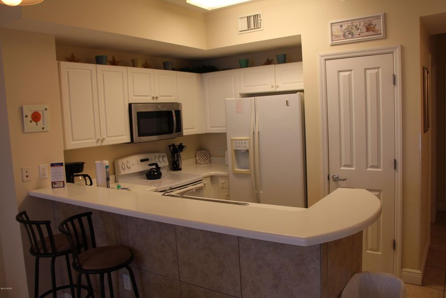 Gulf Front Master & Bunk Room!   Living room and Master Bedroom have Breathtaking Views of the Gulf from Your Private Balcony. This unit has the look and feel of a 2 Bedroom.  The Spacious Bunk Room sets this unit apart, Featuring Ceramic Tile, 9' Ceilings, Solid Surface Counter tops, and Double Vanity in Master Bath.  Celadon Resort Features Include 2 Pools(1 Heated Indoor/Outdoor & 1 Gulf Front), 2 Hot Tubs, Fitness Facility, Hi-Speed Internet, Clubhouse, Gazebo/Grilling Area, Tennis Court, 4 Story Parking Garage with Climate Controlled Walkover  and 3 High Speed Elevators.