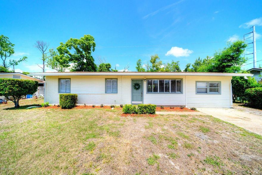 This centrally located 3 bed, 1 bath home is tucked away on a peaceful street in Historic St. Andrews. This home has several updates including new kitchen counter tops and appliances, laminate flooring, and fresh paint. The eat-in kitchen features plenty of cabinets and counter space. The enclosed carport is the perfect space for an office, den, or additional bedroom. The master bedroom features a spacious closet and the two guest bedrooms have built-in shelving. The full bathroom is equipped with a shower/tub combo and vanity. There are 2 hallway closets for additional storage space. Sliding glass doors in the kitchen lead to the large backyard. Indoor laundry/utility room. This home is located just minutes from the Bay, local restaurants, shopping, schools, parks, and more.