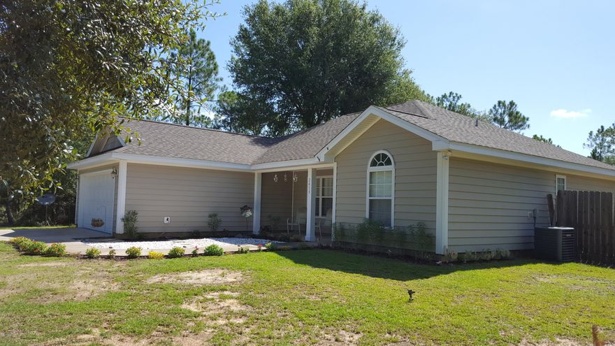 Sunny Hills, a quiet and peaceful community to take away all the business of life.Home is situated on the lower end of sunny Hills community and only 20 minutes from Lynn Haven and 45 from the World's most beautiful beaches.At 2415 Aquarius is a home with three bedrooms and two baths with a family room open to the dining area next to the kitchen. In the kitchen are stainless appliances, real wood cherry cabinetry and a laundry room with extra storage and shelving and full size washer and dryer. The split floor plan allows for privacy from your office, your guests or your family. This is a boater's dream home with lakes located very close to the home, one of which is Boat Lake that is 2 miles from home with sandy beaches and picnic area. Golf community with access to the course. The lot measures 98 x 150 and has a true front yard and backyard along with a two car garage. There are no upgrades needed and this home will qualify for FHA, VA, USDA (100% financing), Conventional financing or cash.