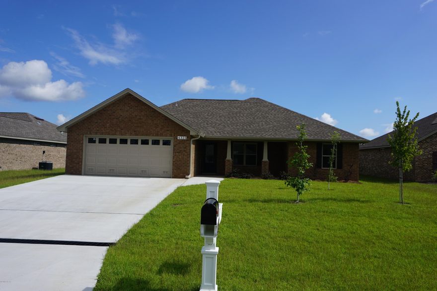 Construction almost complete. 3 bedroom 2 bath all brick home that offers front porch, Master bath with his & hers double shower with Rain maker (3 shower heads) & shower seats on both ends, walk in closet and sitting area off the master bedroom. The kitchen is a dream with all real wood cabinets, solid surface countertops, & stainless steel upgraded appliances. There are cabinets in the laundry room. Living room with and electric fire place and crown molding. Home comes with a security system & generator ready electrical outlet with cord. Outdoors there is an enclosed screen patio, outside shower and sprinkler system. Home is built to 140 MPH wind code. At Bylsma Manor Estates with many homes already built and waiting for you to tour today.  If important measurements should be verifie