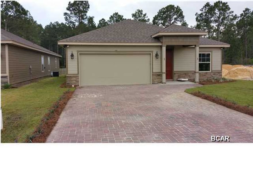 New Construction at Hidden Ridge! SELLER WILL PAY $5000 TOWARDS CLOSING COSTS!! Should be finished by 20 May 15. Hidden Ridge is a New 21 Home, Secluded Subdivision in Lynn Haven off Hwy 390. Hidden Ridge has Underground Utilities, Paver Driveways, Sidewalks and Decorative Street Lights. This Home will be completed in approximately 10 days. This beautiful 4 Bedroom, 2.5 Bath New Construction Home features 9/10 Foot Ceilings, 20 inch Porcelain Tile Flooring throughout Main Living Area and Bathrooms. The Kitchen has All Wood Cabinets, Granite Counter Tops with under Mount Sink, Breakfast Island and Whirlpool or Maytag Stainless Appliances. Some of the Standard Features include: Tremendous Master Walk-In ''Step Down'' Showers with 2 Shower Heads, 8ft Interior Doors, Crown Molding, Paver Driveways, Upgraded Carpet and Pad, 14 SEER Heat Pumps, Anderson LOW E Double Paned Windows, Radiant Barrier Roof Decking (Reflects Heat Away), and a Security System. Put Hidden Ridge and this wonderful New Home at the Top of your List of Places to See.