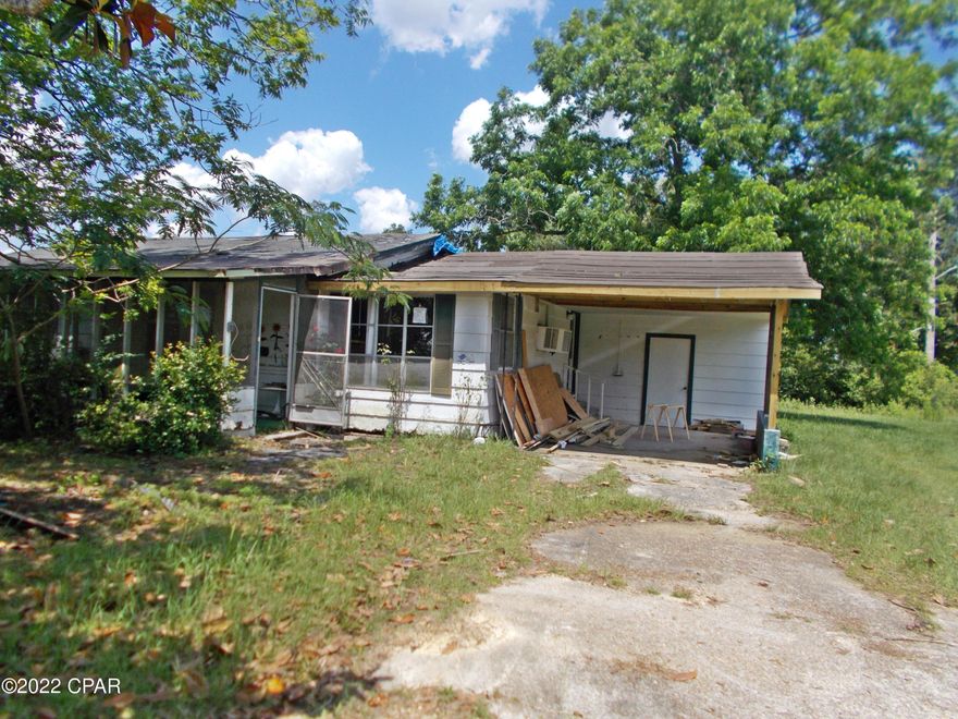 Handy Man special, this home is in a very good location just minutes from town or the interstate, it is a 3/1 with a carport on almost an ac. it is damaged from Hurricane Michael but has a lot of potential you can rebuild to suite yourself; you could easily turn the carport into additional living space.  Lots of possibilities.