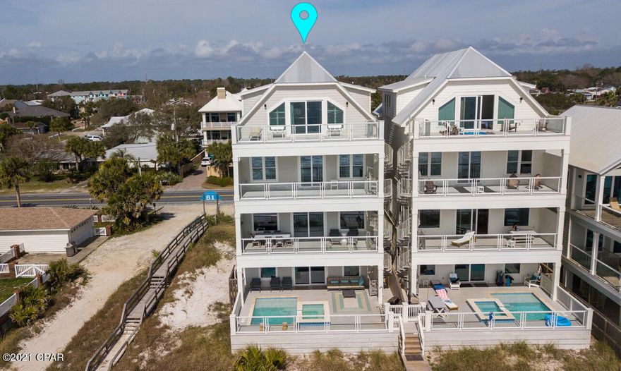 The epitome of class in a beach house! It is beautifully decorated and has enough room for friends and family at the same time. It has 4 stories, 9 bedrooms and 9.5 bathrooms. Each bedroom has a bathroom and the rooms are spacious and so inviting. The main kitchen is on the second floor equipped with dining area and balcony for outdoor entertaining. The first floor also has a kitchen and the private pool which overlooks the spectacular Gulf. Each floor has a balcony and a spiral staircase to make moving from the each balcony easy. This home is one to see to get the full effect of how truly breathtaking it is! Call to make arrangements for your private showing.