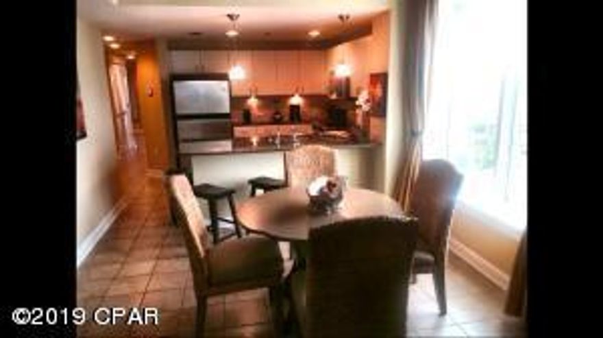 Beautiful three bedroom end unit at Grand Panama priced well below market price for a quick cash sale.  (Must close by August 31).  This fully-furnished, rental ready unit has been a rental machine and sleeps up to 14 people with a king bed in the master, queen in the guest room.  Double bunks in the third bedroom, double bunks in the hall and a sleeper sofa in the living room.  Grand Panama has many upgraded features in its units including granite counters in the bathrooms and kitchen, stainless appliances, oversized molding and many more extra touches that make this a fantastic property to enjoy as a second home or turn key vacation rental.