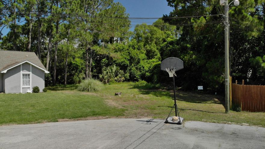 Hard to find lot in convenient woodlawn subdivision.  Located in one of the newer phases at the back of the subdivision surrounded by nice homes.  Very private with little to none ride by traffic.  City water and sewer available from the City Of Panama City Beach.