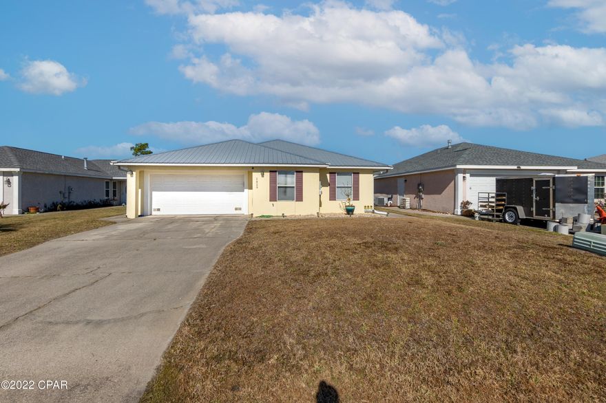 Beautiful home located in Pine Tree Place with Underground Utilities and streetlights; This well maintained 3 bed 2 bath split floor plan home has a spacious Kitchen, located in a limited traffic area on a Cul-De-Sac, minutes to Tyndall Air Force Base, Downtown Panama City, Restaurants, Hospitals, and Beaches. This centrally located home is Move-In-Ready with a modern Open Floorplan featuring a privacy fence back yard and comes with an Above Ground Pool, Covered Patio, Workshop, Newer Roof (2019), and New Water Heater (2021). This house is perfect for 1st time homebuyers, Military, Investors, and Aging parents.  All info is approx., buyer to verify all deemed important.  Located in High Demand area so Don't delay, Call Today for your private showing before this one gets away. No HOA, NO Flood Insurance Required and Pool.  Location is everything and this home is near Tyndall Parkway/Hwy 98 that leads to Mexico Beach, Panama City Beach, and all along the coast of Northwest Florida.  The other nearby road is US HWY 231 which is the main road into Panama City Florida.  Being centrally located is great for enjoying all Northwest Florida offers and enjoyment of the expanding Panama City where there is always something to do.  This home is like new in appearance and condition and back yard can easily be converted to your needs as the pool is new but is also temporary so it can be removed easily.  There is room for pets and gardening and many uses for the Workshop located by the backyard firepit.  Come see this home and decide for yourself just how perfect this home is for anyone to call "Home".