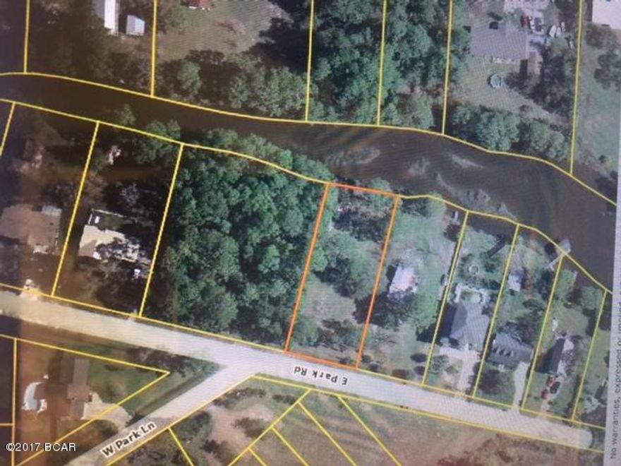 Nice level building lot in Callaway. Near the bay, easy access to the bay by a canal at rear of property. 

 Please verify measurement if important.