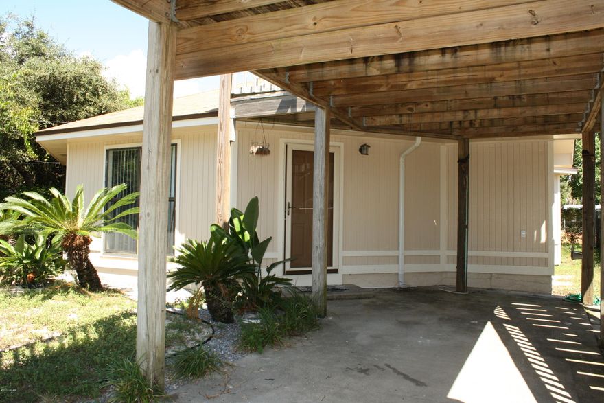 This home is Octagon shaped 2 bed 2 bath. Located close to the Beach and Gulf. Just a short walk to the beach and Gulf. The house has an observation deck. The yard is fenced and is in a wonderful subdivision. There is new carpeting throughout.