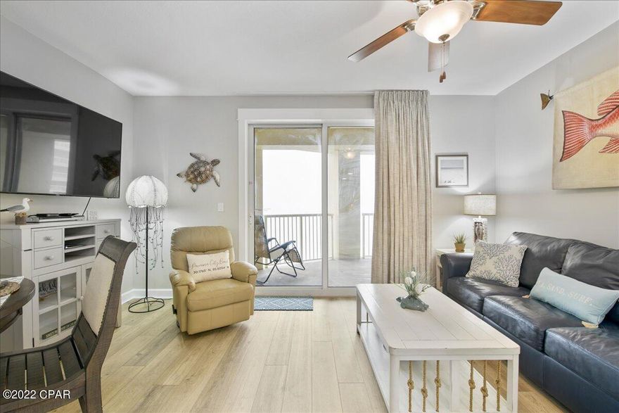 CURRENTLY UNDER CONTRACT, SELLER ACCEPTING BACKUP OFFERS. Immaculate, like new, one bedroom/2 bath condo with outstanding views of the Gulf and city skyline.  Located within one of Panama City Beach's finest luxury resorts, this unit is truly turnkey and fully furnished for personal use or rental.  This freshly painted (2021) condo has upgraded furniture (2020) and appliances; new flooring (2020), HVAC system (2021), hot water heater (2019) and designer draperies.  The bedroom boasts a king-size bed, while the large master bath has a double granite vanity and over-sized shower.  Purchase includes rental of an over-sized storage room (for 2022) located across the hallway from the front door.  Very few units are in such good condition and this one won't last long.