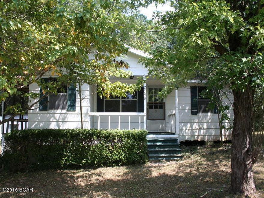 * PRICE REDUCED * Modest sized home in town with city water and sewer. Comes with 3 bedrooms, a formal living room, dining room and kitchen. The lot is nice size with 2 sheds and a 2 car detached caport/pole barn.There is nice screened in back porch and a front porch.