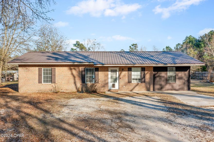 Welcome to the perfect blend of classic charm and modern comfort! This renovated brick home, nestled on a generous 1-acre lot, offers a timeless sanctuary just waiting for you to call it home! With 3 bedrooms and 1 bath, this residence is thoughtfully designed to cater to both functionality and style. Step inside and you will find a warm and welcoming living room offering a cozy space for family gatherings that flows seamlessly to the kitchen boasting new cabinets, countertops, stainless steel appliances and subway-tiled backsplash. The versatility of the bonus room allows for creative use, whether it be a 4th bedroom, cozy den, or hobby space, this room provides flexibility to suit your lifestyle. Home is conveniently located just off Orange Hill Road, this home provides easy access to Hwy 77, Falling Waters State Park, and Interstate 10.