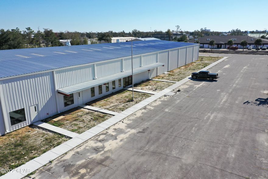 The former Bell Signs Building is available for lease. The 84,000 square foot building sits on +/-8 acres of land that could provide secure yard storage and rail-service if needed. 25,920 sq. ft. to 58,080 sq. ft.. Central Panama City location off W. 11th Street. The owners are completely renovating the building that includes: new roof, new purlins, new metal siding, new gutters & downspouts, new roll-up doors. Completion Fall '21. 18' Eave-height. 4 dock-height loading doors and numerous oversized street-level loading doors. Fully-sprinklered. 3-Phase, 200 to 600 Amp Service. CrossRoads Building Supply has leased the north-end of the building. Call with any questions and to setup a tour.