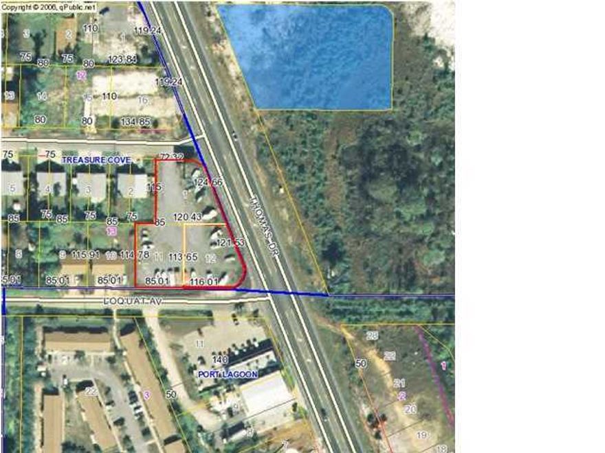 Commercial Parcel on Thomas Drive. Approx 3/4 acre with +/-245 ft. of frontage on Thomas Drive. Three separate parcels included: 31074-000-000,31070-010-000 and 31073-000-000. The property is currently used as a boat storage facility, which is fenced. There is also a Lamar Advertising billboard on the site.