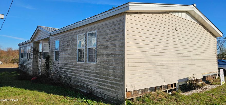 Great Investment Property!! Take a look at this 4 Bedroom 2 Bath 2280 sq ft DWMH. The home needs work but with the right touch this can be a beautiful home! Located on .30 acre on a paved road in Altha Florida. Easy access to Panama Cities most Beautiful Beaches! The home was condemned after Hurricane Michael but with a little remodeling and a new septic tank, the condemning can be reversed according to the county. There is a well already in place and needs to be hooked up. Call today for more information.