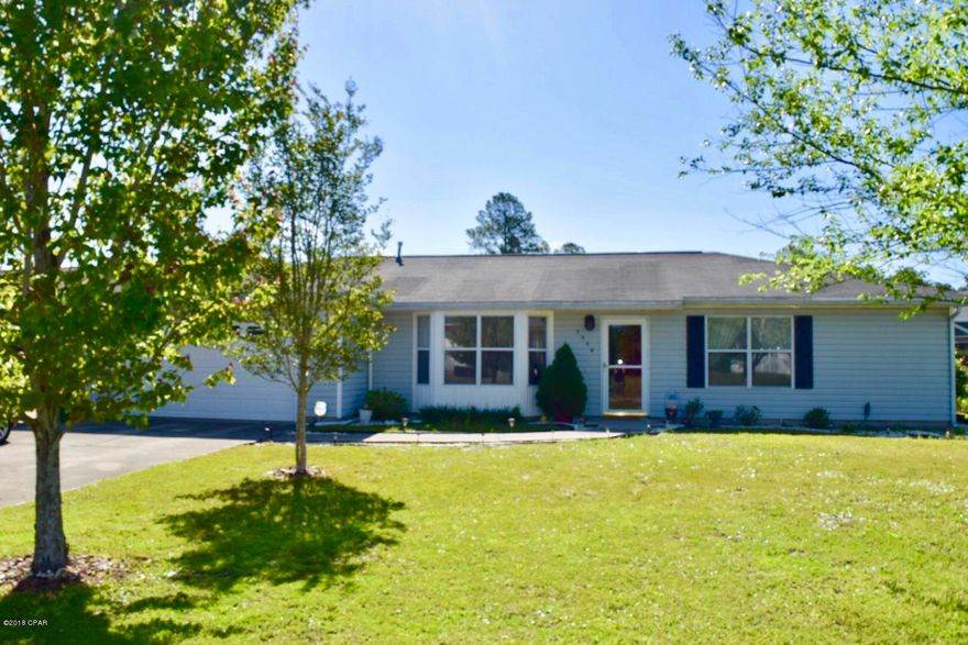 Well maintained home in a nice quiet neighborhood only 5 to 10 minutes from Tyndall Air Force Base. Home has 3 bedrooms and 2 1/2 baths with heated inground pool and screened in patio. This home has an open floor plan with builtins for entertainment center in the living room, solid surface counter tops in the kitchen and a florida room over looking the pool. Customized bedroom and bath configuration. Bedrooms are very well sized with one bedroom separate from the others with a sitting room attached.  This room has two closets one is a very large walk in. The second bath is located just outside of this room. Perfect for a second master if needed. Nice walking path around a pond right behind the home.