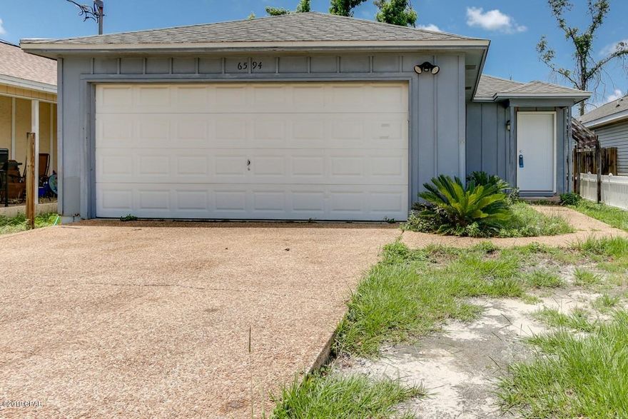 AFFORDABLE HOUSING CLOSE TO TYNDALL AND EASTERN SHIP BUILDING. Check out this 3 bedroom, 2 bath home with a 2 car garage. The interior has been updated with fresh paint, brand new flooring and fixtures, updated counter tops in kitchen, brand new fridge, and offers a great open floor plan. The back yard is a good size and their is nice screened in patio off the back of the home with access from both the master and one of the additional bedrooms. If you are looking for an affordable home this is one to see. Call your Realtor today to see this great home.