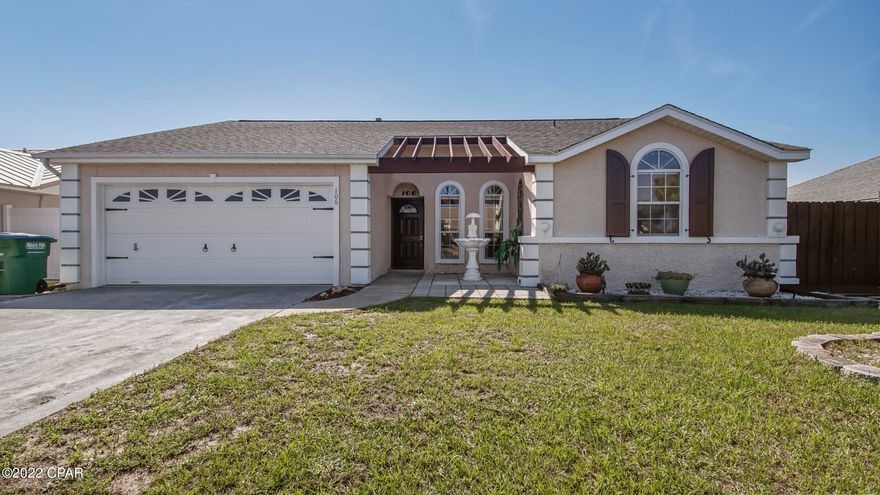 Price reduced $30,000!!!!! This beautiful 3/2 home with a 2 car garage in SEACLUSION BEACH subdivision is full of charm.  It has high ceilings, an open floorplan and a huge pool in the backyard with plenty of room for entertaining. This home is located in an area that does NOT allow short-term rentals. This golf cart community has 5  gated and coded PRIVATE BEACH ACCESSES for use only by its community members.  This gorgeous home is a must see!