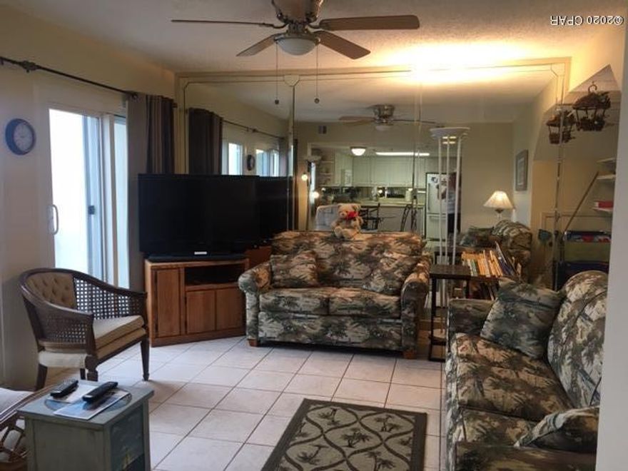 Great 2 bedroom/2.5 bath townhouse-style unit on the third floor of Pinnacle Port's Tower building.  The living room and its balcony overlooks Lake Powell.  The unit comes fully furnished and is a vacation rental.   The upstairs Master bedroom is Gulf-front with its own private balcony.  Flooring in the upstairs area is easy care laminate wood with tile flooring in the other areas of the unit.   Pinnacle Port Resort is situated on a 25+ acre site within a beautiful gated community having over ¼ mile of beach frontage!  The complex has lots of amenities including two swimming pools, tennis courts sauna/steam room, fitness room, its own private freshwater dock with boat slips boat launch and wi-fi. Please note that the Association fees include electricity for heating, cooling and hot water.