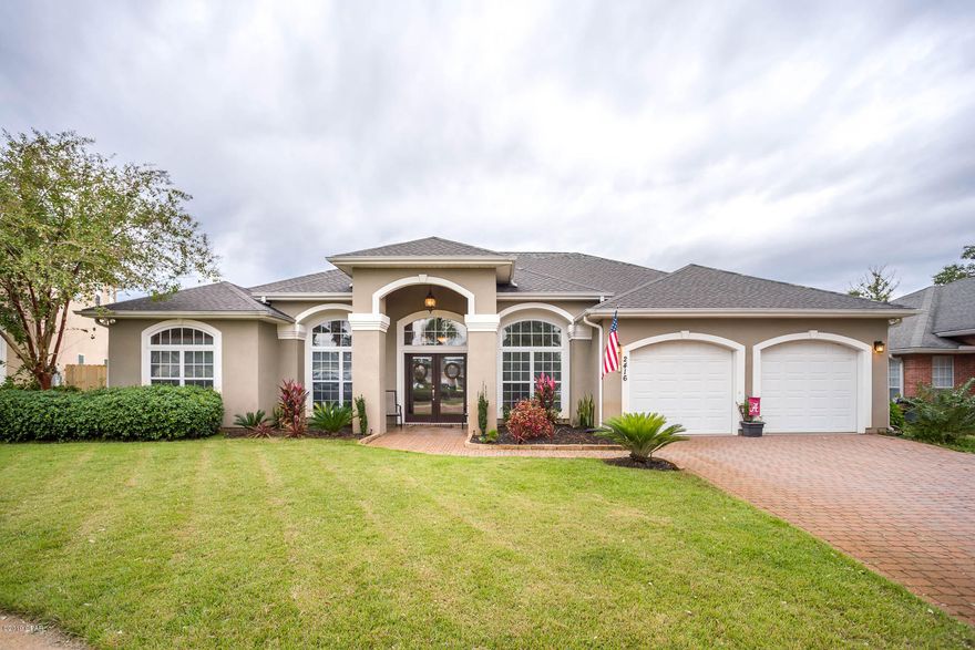 This home welcomes you with excellent curb appeal nestled on a cul de sac in the idyllic community of Pelican Bay. As you Walk through the wood framed glass doors you enter the spacious foyer of this 4 BR 3 Bath home. Split bedroom floor plan with a separate office in addition to the 4 bedrooms. Home has open great room floor plan with fireplace & built in bookshelves. Eat in kitchen opens to the great room and the formal dining room. Master suite includes large Master Bath featuring Corner garden tub with separate tiled shower. Additional 3 bedrooms and 2 baths on the other side of the great room. Florida room was enclosed and is heated and cooled. Fenced backyard has a storage shed and irrigation well for the sprinkler system. Pelican Bay is a wonderful neighborhood with boardwalk walking trails through the protected landscape leading to the bayside community clubhouse, pool, and hot tub overlooking beautiful St. Andrews Bay. There are also 2 community fishing pier/docks.  Convenient to shopping, restaurants, Navy Base, schools, St Andrew's State Park, and the Gulf of Mexico. Age sq. footage and rooms sizes are approx. and must be verified by buyer if important.