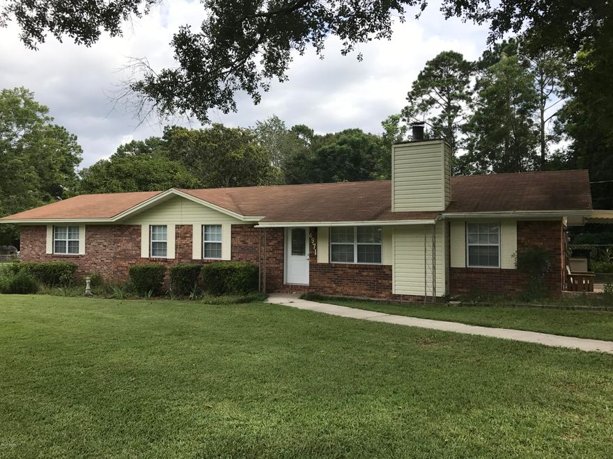 Beautiful 3 Bedroom 2 Bath 2,130 SqFt home on a double lot!  This home is very spacious with lots of natural light.  Some of the many features include new carpet, a fireplace, new fans in all the rooms and a large master bedroom with walk-in closet.  The kitchen is open with an attached dining area, large laundry room and pantry.  Through double doors in the kitchen is nice spacious screened in back porch, patio and large fenced in back yard for relaxing with family and pets.  This property is a short drive to local schools and the area sports complex.  Also, a short distance to many recreational sites including the Florida Caverns, the Mill Pond for fishing, a quick game of golf or shopping.  Schedule an appointment to see all this property has to offer today!