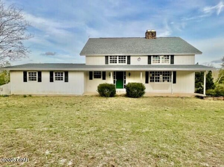 Beautiful tri-level home in the county on 24.73 acres.   The location is private so you will not be bothered with traffic noises, etc.  This home offers much potential as you will need to do some repairs to make it livable.  The bottom floor is like a separate living area as it has a kitchen, living/bedroom area and a bathroom  The 2nd level has the living room with fireplace, dining room, large kitchen with breakfast nook and the laundry room.   Kitchen will have to be completely redone.  There is a bathroom on that floor also with a shower.  The 3rd level has the bedrooms and bath.  There is an attached garage also.  This is such a quiet and peaceful area.
