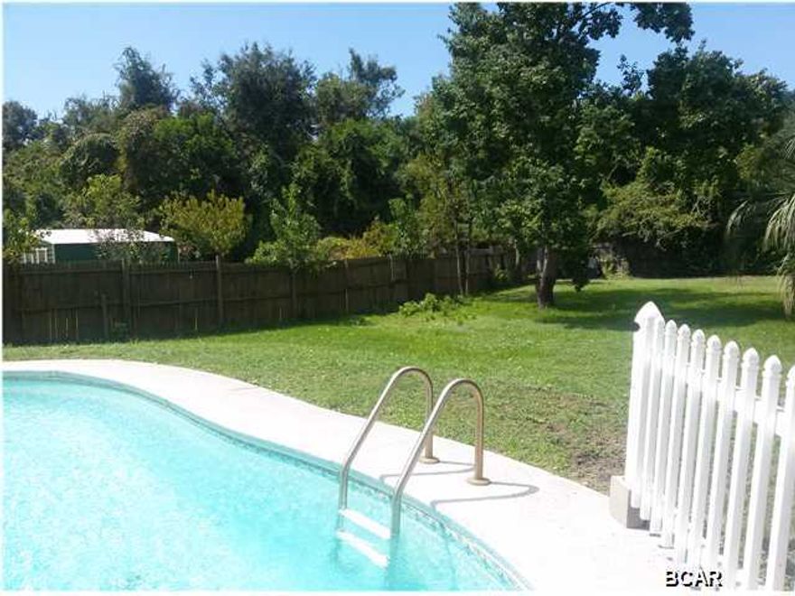 Spacious 3 bedroom, 2.5 bath home with additional loft space and Florida room, located on a small lake. This home has unlimited potential with the open spaces inside to the large back yard that features an inground pool and lake front with lake views. The main floor of the home has the kitchen, dining room, living room, Florida room and master suite. The second floor has 2 more bedrooms and a HUGE loft area for even more space, perfect for an office, study or media room. The exterior of the home is maintenance free vinyl siding and features a large drive way leading to the two car garage. There is an inground pool inside of the fenced in back yard. This home is perfect for entertaining with the extra space from the Florida room and the back yard that leads to a small lake. This home is NOT a drive by, come see it today!