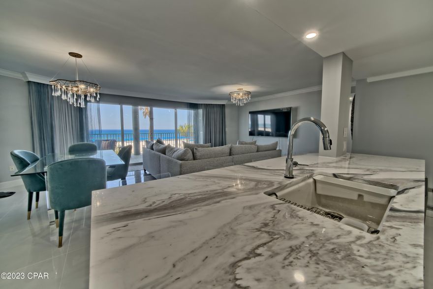 One of a kind must see! Beautifully remodeled 2 bedroom 2 bath in Long Beach Tower II with designer furnishings throughout. This beachfront condo features floor to ceiling windows in all rooms giving sweeping vistas of the beach. One of the largest balconies on the coast to relax on and watch beautiful sunsets. Enjoy easy access to your beach condo with no tight parking garages to deal with. Park in the gated ground level parking lot and walk on up. New 32 inch floor tile throughout. New large tiled bath showers with rainwater shower heads, all new plumbing fixtures and vanities. New waterfall marble kitchen island, marble counter tops and backsplash. All new stainless steel appliances, refrigerator, oven/stove, dishwasher and microwave. New full size washer and dryer. New HVAC and ductwork. New hot water heater. New furnishings and large screen TV's in all rooms. New paint and new custom room darkening drapes in all rooms. Teakwood patio furniture. Long Beach Towers has a large beachfront to enjoy without crowds. Unit is actually on the second floor, the first floor of the building has storage units. All information believed to be correct but should be verified by the buyer.