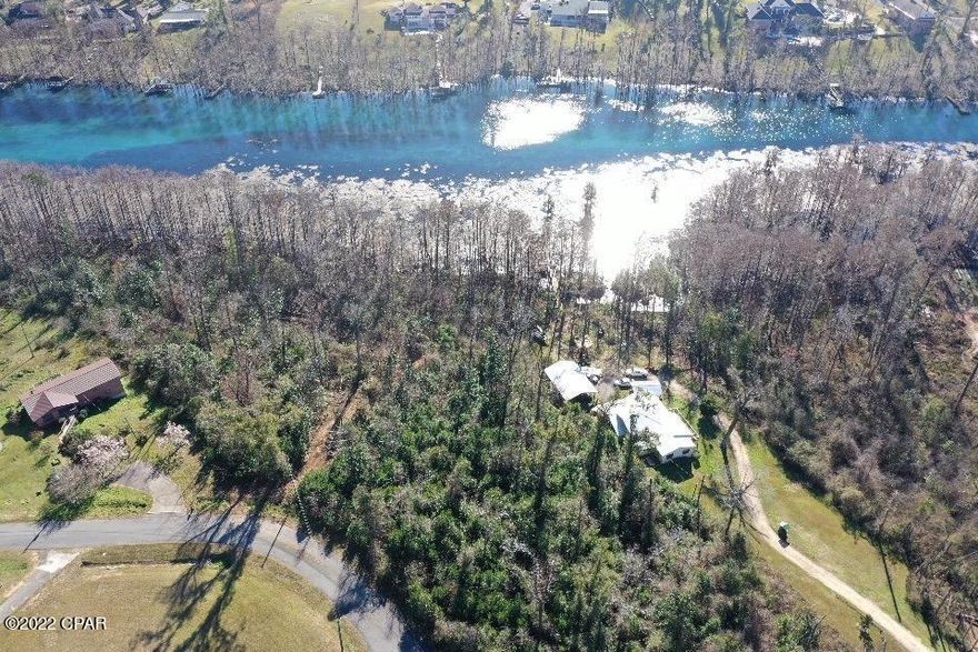 WATERFRONT lot on MERRITTS MILL POND!  If you are looking for your very own piece of paradise, this is it.   This lot is located along a 4 mile long Spring fed river. Fresh water starts flowing at the 1st magnitude spring of Blue Springs with over 20 other feeder springs along the way.  Enjoy swimming in crystal clear water, paddle boarding, kayaking, boating, and some of the best fishing around.   This is an oversized lot compared to its peers.  Call today for your appointment!!