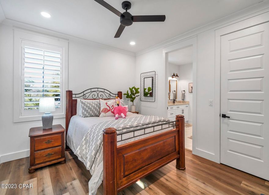 Welcome to ''30A Coastal Retreat'' - 92 Woodland Dr is a home you must see if you are on the market today. 2 Master Suites, one on each floor, 2 Guest Bedrooms with Jack and Jill bathroom on the second floor, large fenced backyard with an outdoor living area, modern summer kitchen perfect for entertaining and well appointed salt water pool for your ultimate beach house living and experience. 10' ceilings, beautiful flooring, custom finishes and details throughout combined with a cozy coastal decor and furniture sets this home apart. Some of the features include, shiplap walls, waterfall kitchen island with a 3 cm quartz countertops, white shaker cabinets, SS appliances, 36' gas range, marble tile backsplash and more. The living room offers the perfect dry bar with wine fridge and

The living room offers the perfect dry bar with wine fridge and open wood shelving. Sliding glass door opens up to the ultimate outdoor living area with everything you need for a perfect sunshine day. Relax around your private pool, sip in summer cocktails, read your favorite book or show off your culinary skills grilling and entertaining. In addition there is an outdoor shower, full 1 car garage with owner's storage and a spacious Laundry room conveniently located on the 1st floor with plenty of cabinets above the washer/dryer as well as a lower set of cabinets with quartz countertop.
The home is perfectly located less than a mile from the white sand beaches and turquoise waters of Walton County (Ed Walline Beach Access). Hop on your golf cart and visit Gulf Place Town center - home of some of the best local shops and restaurants in the area and the Amphitheater has fun events year round. Gulfview Heights has no HOA so you can enjoy a laid back atmosphere with no extra rules. Rental projections are showing over $100k in income. The home is sold furnished with some exclusions (see list of exclusions). Within 15 min east and west you can enjoy Grand Blvd shopping and dining, Sandestin Resort, Grayton Beach, Seaside, local schools, hospitals and groceries, natural parks...everything 30A has to offer to its residents and guests. Call today! Come fall in love with your Beach house here in Walton County! All details are believed to be accurate. Buyer, Buyer's agent is responsible to verify all as needed.