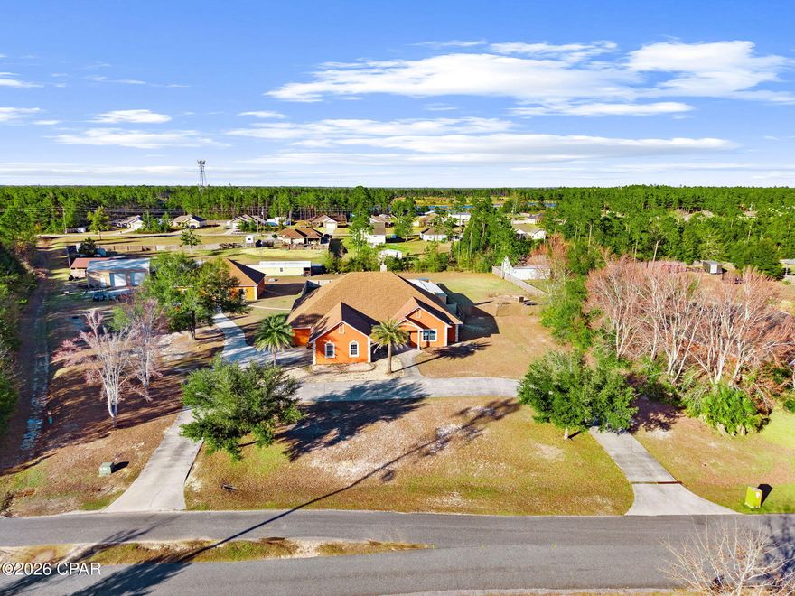 As-Is Opportunity with Strong Fundamentals & Exceptional Potential
A rare opportunity for an investor or owner-occupant who understands value and vision! Offered As Is, this home primarily needs fine-tuning, cosmetic updates, and selective improvements, the best and most important parts of the home are in use, intact, and functional, providing a solid foundation to elevate the property to its full potential.

The home was originally designed with 6 bedrooms, featuring five bedrooms in the main residence and an additional sixth bedroom within the finished workshop/garage space; ideal for guests, extended family, or future apartment conversion. Note- the cabinets and appliances in the finished garage do not convey with sale.
Several bedrooms would benefit from new flooring, allowing the next owner to update finishes while preserving the home's generous layout.

The gourmet kitchen showcases granite countertops, custom cabinetry, and a built-in wine rack. With thoughtful updates, this space can easily be brought back to life as the true heart of the home. The primary suite is one of the most impressive features: exceptionally spacious and beautifully laid out, offering the scale and presence buyers seek in a true owner's retreat. 
Bonus is one of the additional bedrooms offers the flexibility to function as a second primary suite, perfect for guests or multi-generational living.

A double-sided fireplace anchors the living spaces, adding warmth, character, and architectural interest, while a dedicated movie room/media room provides an ideal setting for entertaining or relaxing at home.

Beyond the main residence, the property features a 40' x 50' heated and cooled finished garage/workshop 
Additional garage and workshop spaces, each with two bay roll-up doors, further enhance the property's versatility.

The backyard includes a separate outbuilding, previously being converted into a shooting range, now offering a blank slate for the next owner's vision.
 
The in-ground gunite pool with attached jacuzzi adds significant appeal, with the waterfall feature (not currently functioning) offering potential to be restored with additional investment.

This is not a teardown or major reconstruction: this is an opportunity to polish, update, and enhance a home with strong bones, standout features, and exceptional flexibility.

Sold As Is. A strategic opportunity for buyers who recognize long-term value and upside. Important NOTE! Cabinets and Over/stove in the heated and cooled detached garage DO NOT convey.