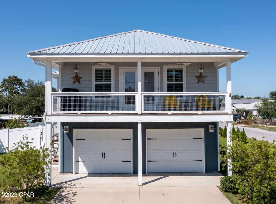 CURRENTLY UNDER CONTRACT, SELLER WILL CONSIDER BACKUP OFFERS. Back on market due to no fault of the Seller.   Sold Furnished As Is, with beautiful beach décor.  Seller is offering $10,000 concession for Buyer closing costs or rate buydown.
 Welcome to the breathtaking emerald coast. Within a few blocks is the white sandy beach access 13.  The interior of this beautiful home features an open great room with hand scraped plank flooring, spacious dining area and a charming covered deck with a peek of the emerald waters! The Kitchen offers granite countertops, custom white cabentry and black stainless appliances. The Primary Suite is off the main living area and includes double closets and a stunning Master Bath with a walk in shower.  Downstairs there are 2 private bedrooms and a full bath. There is a 2 car garage for parking and storage.  Large corner lot allows extra space for a pool, workshop, RV or Boat Storage.