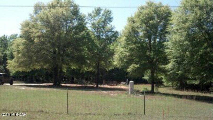 PRICE REDUCED!! BEAUTIFUL ACREAGE LOCATED JUST OUTSIDE OF MARIANNA. PREVIOUS HOME SITE WITH WELL, SEPTIC SYSTEM, AND POWER IN PLACE. FRONT HALF OF PROPERTY IS CLEARED WITH VERY NICE, LARGE OAK TREES. THE REST OF THE PROPERTY IS WOODED, BUT COULD BE EASILY CLEARED FOR MORE ROOM. DRIVE BY AND TAKE A LOOK TODAY. PLEASE CALL WITH ANY QUESTIONS.