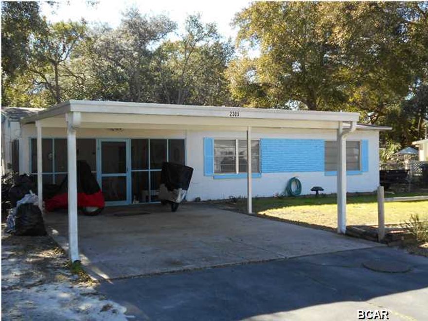 Cozy St. Andrews home with lots of room. This 3 bedroom, 2 bath home has nice size bedrooms and a bonus room for an office. Enter the home through a screened in Florida room that's great for that late afternoon social hour. The kitchen has all newer appliances, and a pass through window to the living room. There is a nice gas fire place in the living room, along with built in book shelves. The inground pool and pool equipment is less than one year old, and still under warranty. You will also have a nice 10x10 storage shed, along with a great 12x20 work shed that has both a roll up door and entry door. Sellers are offering a one year home warranty with this home. Located just a little ways from the festivities of St. Andrews, this home is ready and waiting for your family.