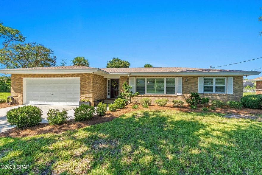 Step into the epitome of modern comfort and convenience with this exquisite 4-bedroom, 2-bathroom brick home, nestled in the peaceful Woodlawn neighborhood. As you approach the property, you'll immediately notice the charming curb appeal and the well-maintained landscaping that sets the stage for a truly inviting experience. The open floor plan and spacious living area welcomes you with an abundance of natural light. The kitchen boasts gleaming stainless-steel appliances, Staron Solid Surface countertops, and a breakfast bar. The master suite is a tranquil retreat, offering a spacious bedroom with large walk-in closet. Three additional bedrooms provide ample space for guests, children, or a home office. Each room is tastefully appointed, with large closets and plenty of natural light. Step outside into your own private oasis. The backyard is fully enclosed with a privacy fence, offering a secure and serene space to relax and entertain. A sparkling pool with hot tub takes center stage, and the covered patio takes your outdoor experience to the next level. Whether you're hosting a barbecue or just enjoying a quiet evening by the water, this backyard is perfect for all your outdoor activities. If you need additional storage, this property has you covered with not one, but two storage buildings, ideal for stashing away tools, equipment, or seasonal items. Convenience is at its best with a spacious 2-car garage that provides ample parking and storage space. Short-term rentals are a viable option, offering a potential income stream for those seeking to invest in the thriving rental market. Plus, no HOA. Don't miss your chance to own this stunning brick home with a pool.