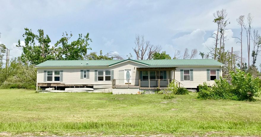 Investors Special. Large mobile home on large lot. Fixer upper or remove and build on the lot. Possibility of multiple homes or townhouses. Sold as-is.