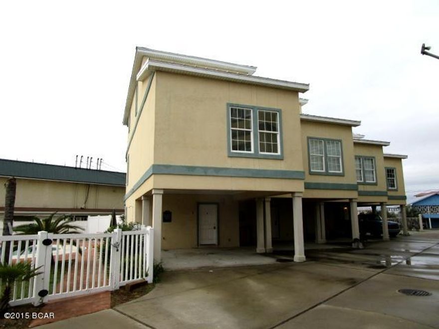 UNBELIEVABLE OPPORTUNITY to own a three-story townhome within walking distance to the Gulf and a few miles from Pier Park!  This unit consists of an efficiency apartment on the main floor with a kitchenette, and a glass-sliding door to the outside patio.  The second floor has the kitchen, living area with a balcony, and a bedroom with a full bath.  The entire third floor is a large Master bedroom with plenty of room for a sitting area, as well as a spacious Master bath and walk-in closet.  The unit has a carport and the complex has a community pool.  Home is being sold in its AS IS condition.