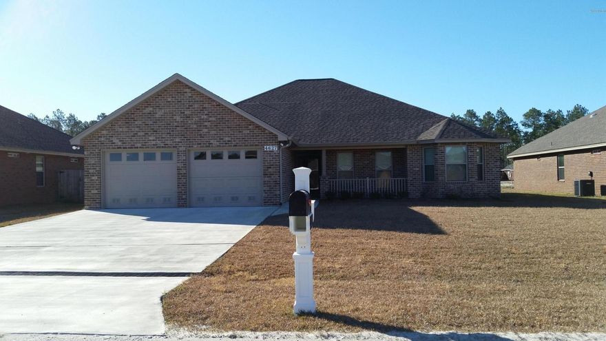 This is for Comps. Construction Complete. Minutes From Mall This Fine Built Home by locally renowned builder is 3 bedroom 2 bath all brick home that offers master bath with his & hers double shower with Rain maker (3 shower heads) and shower seats on both ends, and walk in closet. The kitchen is a dream with all wood cabinets, solid surface countertops, and stainless steel appliances. There are cabinets in the laundry room. Living room with and electric fire place and crown molding and formal dining room. Home comes with a security system and generator ready electrical outlet with cord. Outdoors there is an enclosed screen patio, outside shower and sprinkler system. Home is built to 140 MPH wind code